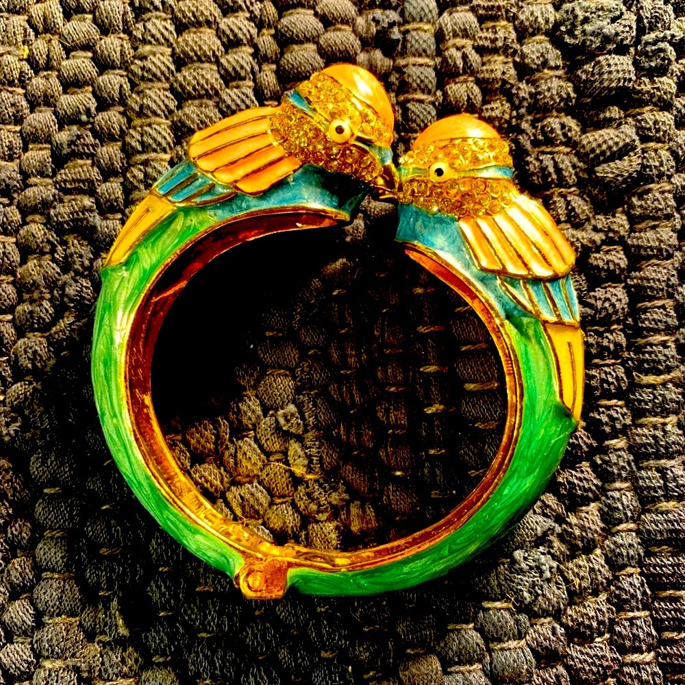 Gorgeous closonne’ bracelet kissing birds. Enameling is beautiful.